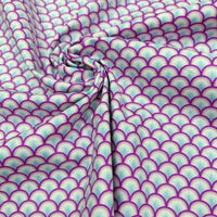 Pink scales blue feathers on white fabric by Liberty Fabrics