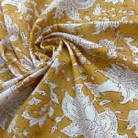 Block Print White Floral on Mustard Background