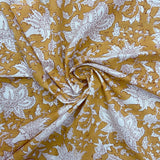 Block Print White Floral on Mustard Background