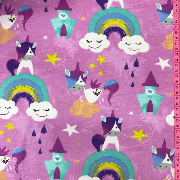 Stof France unicorn knit fabric in purple